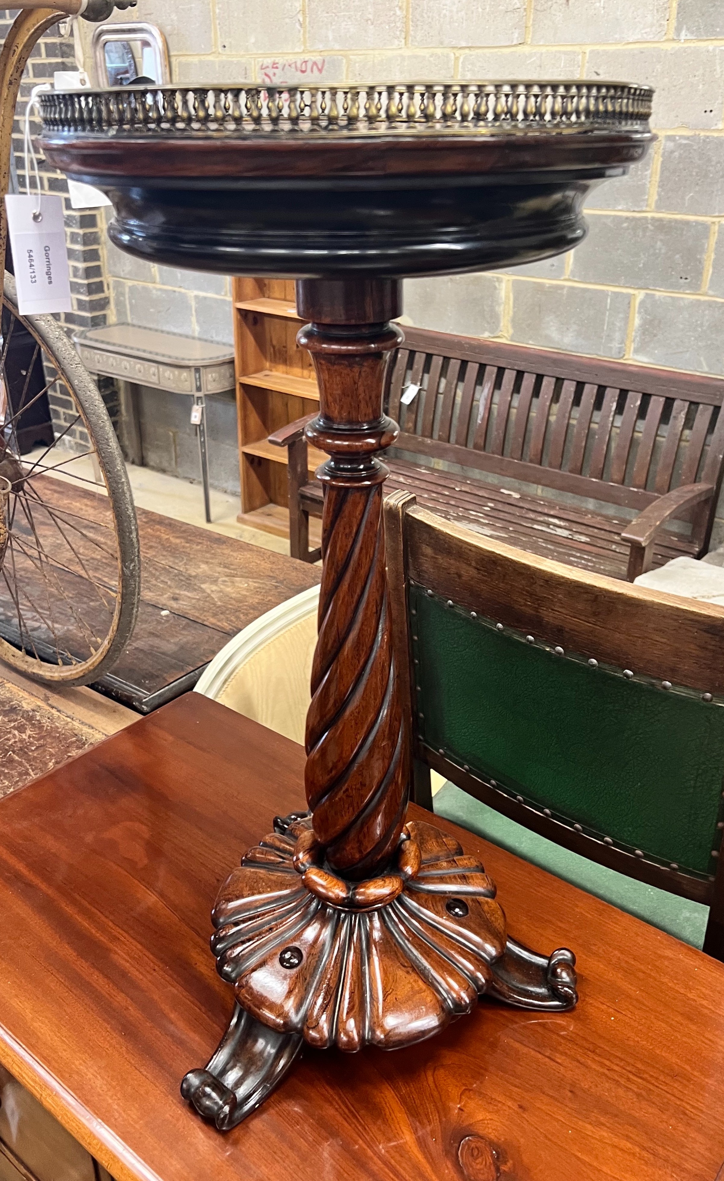 A William IV circular galleried rosewood jardiniere table, diameter 39cm height 79cm